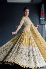 Yellow Heavy Butterfly Net Beautiful Embroidery Work Bridal Lehenga