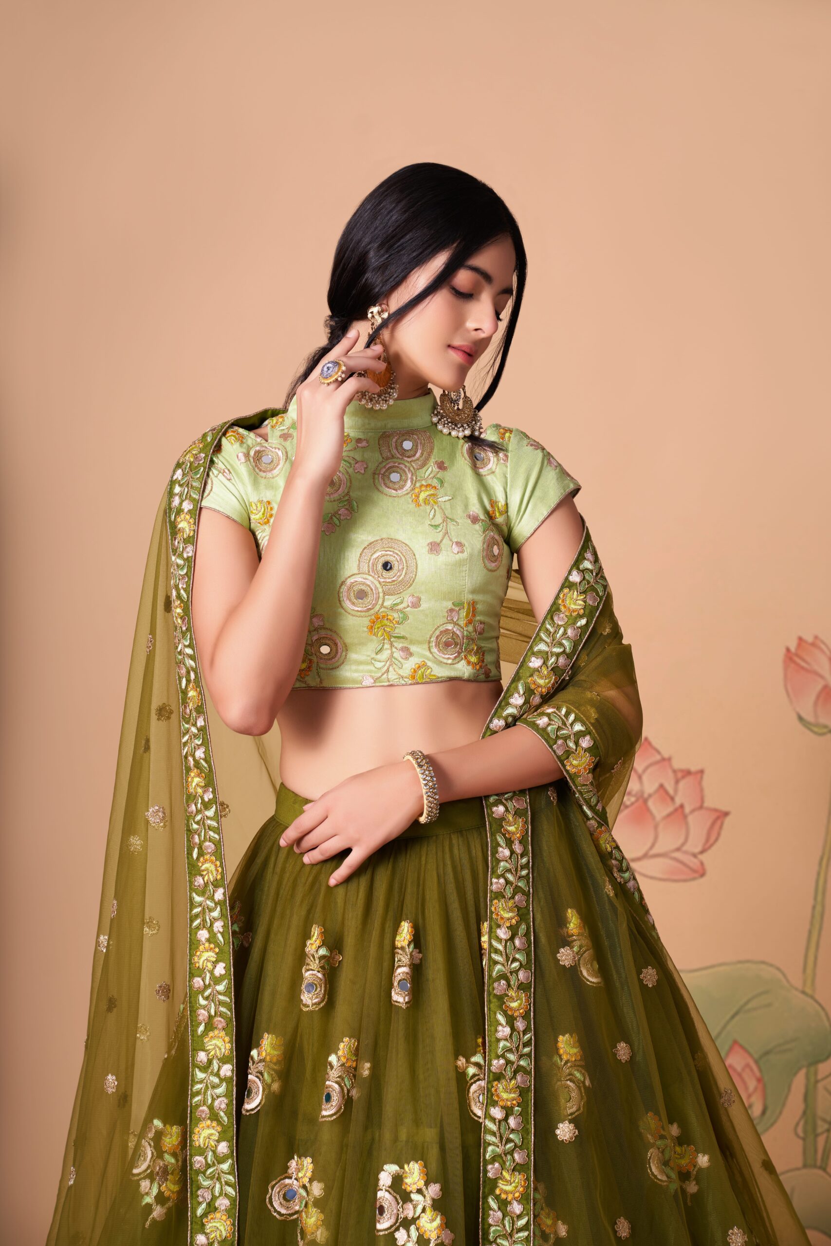 Mehandi Color Soft Net Fabric Sequence Embroidery With Mirror Work Lehenga