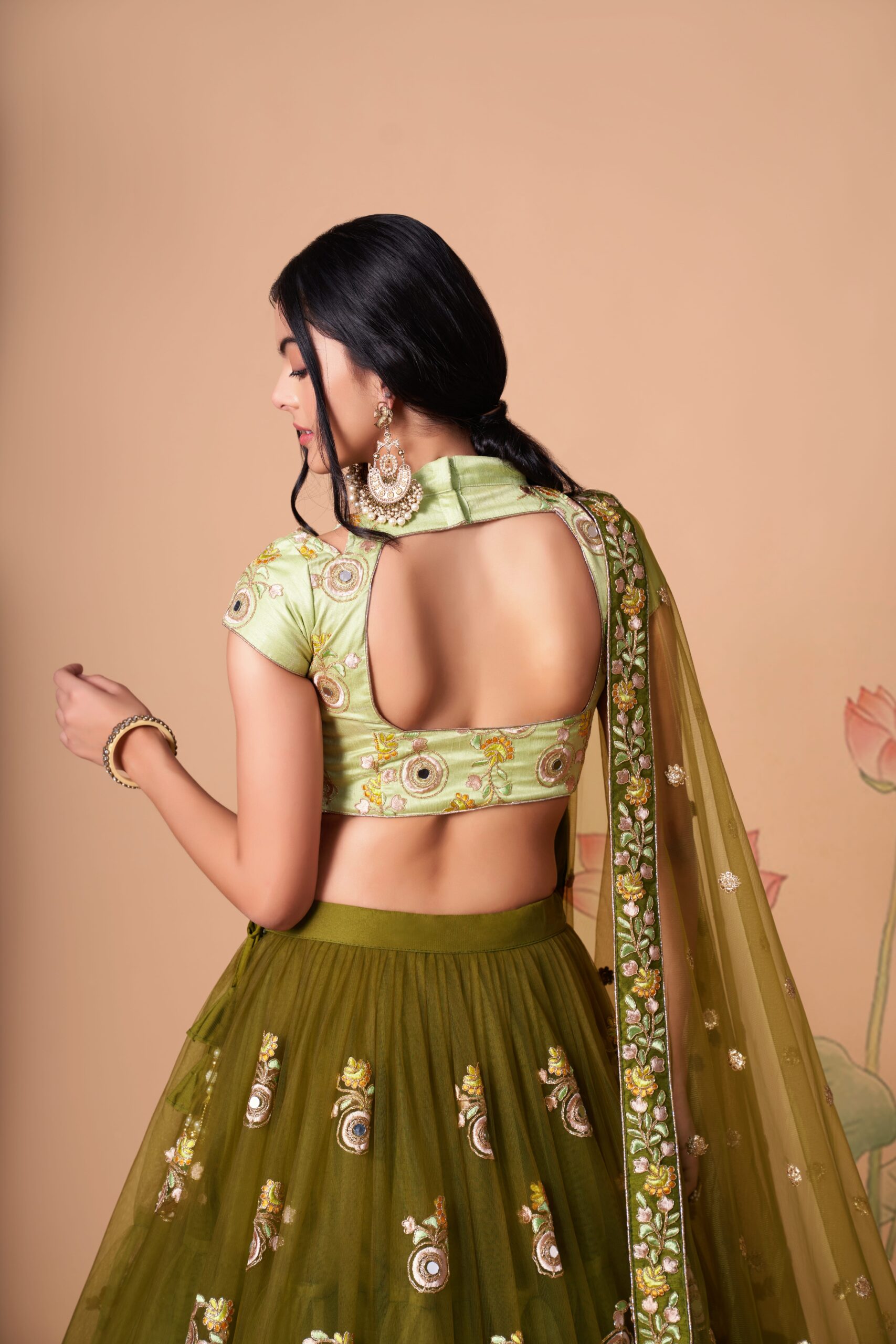 Mehandi Color Soft Net Fabric Sequence Embroidery With Mirror Work Lehenga