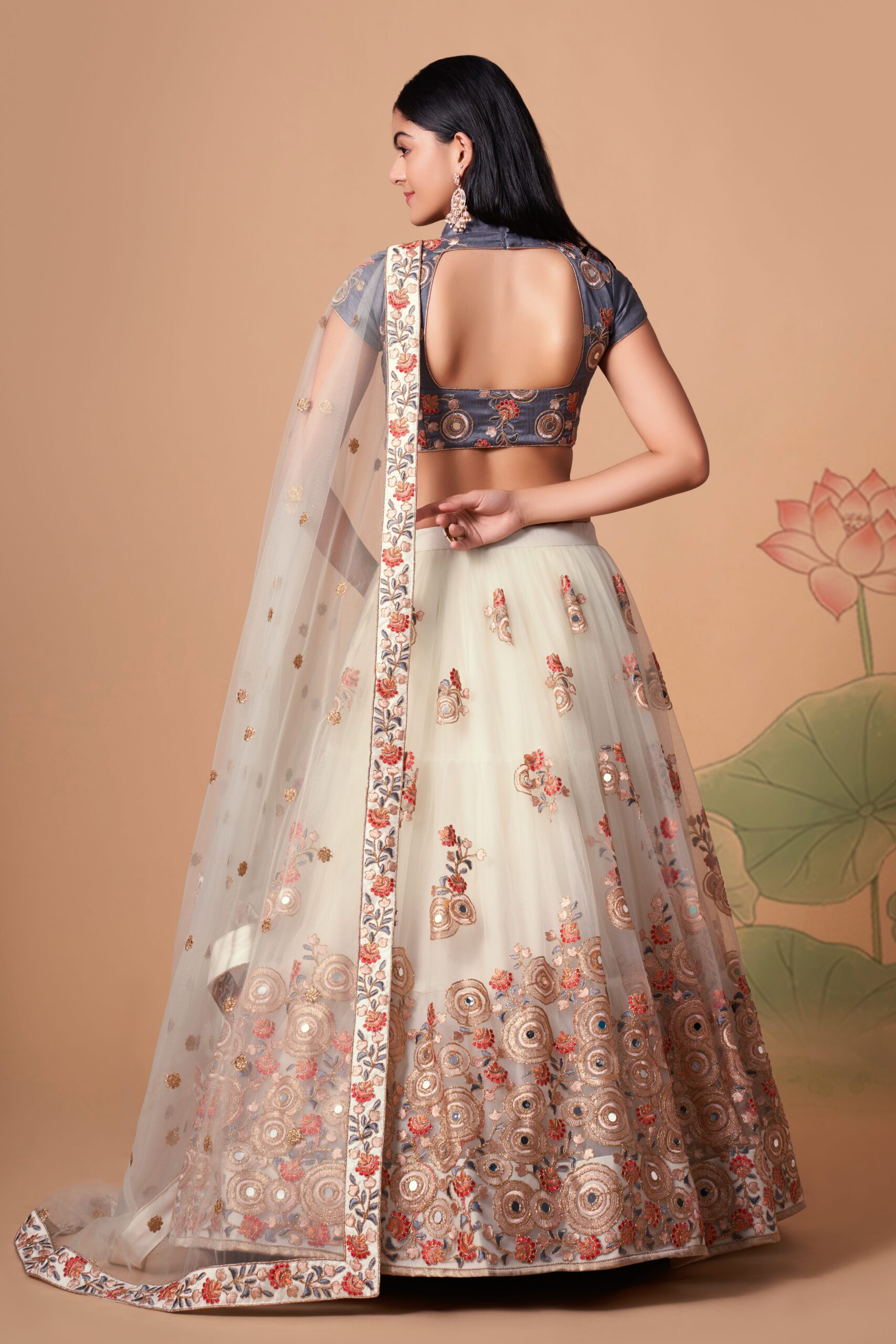 Off White Color Soft Net Fabric Sequence Embroidery With Mirror Work Lehenga
