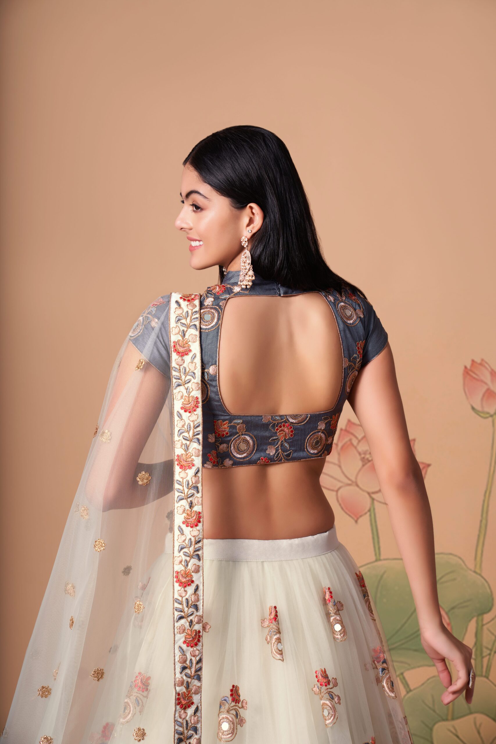 Off White Color Soft Net Fabric Sequence Embroidery With Mirror Work Lehenga