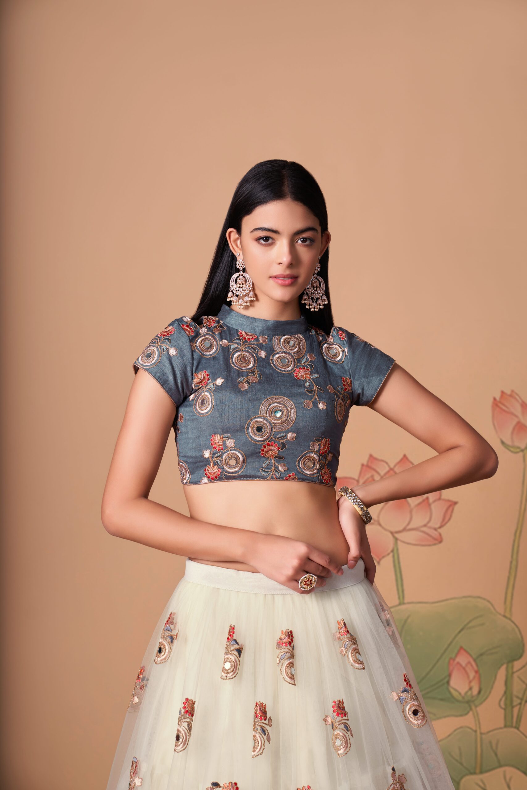 Off White Color Soft Net Fabric Sequence Embroidery With Mirror Work Lehenga
