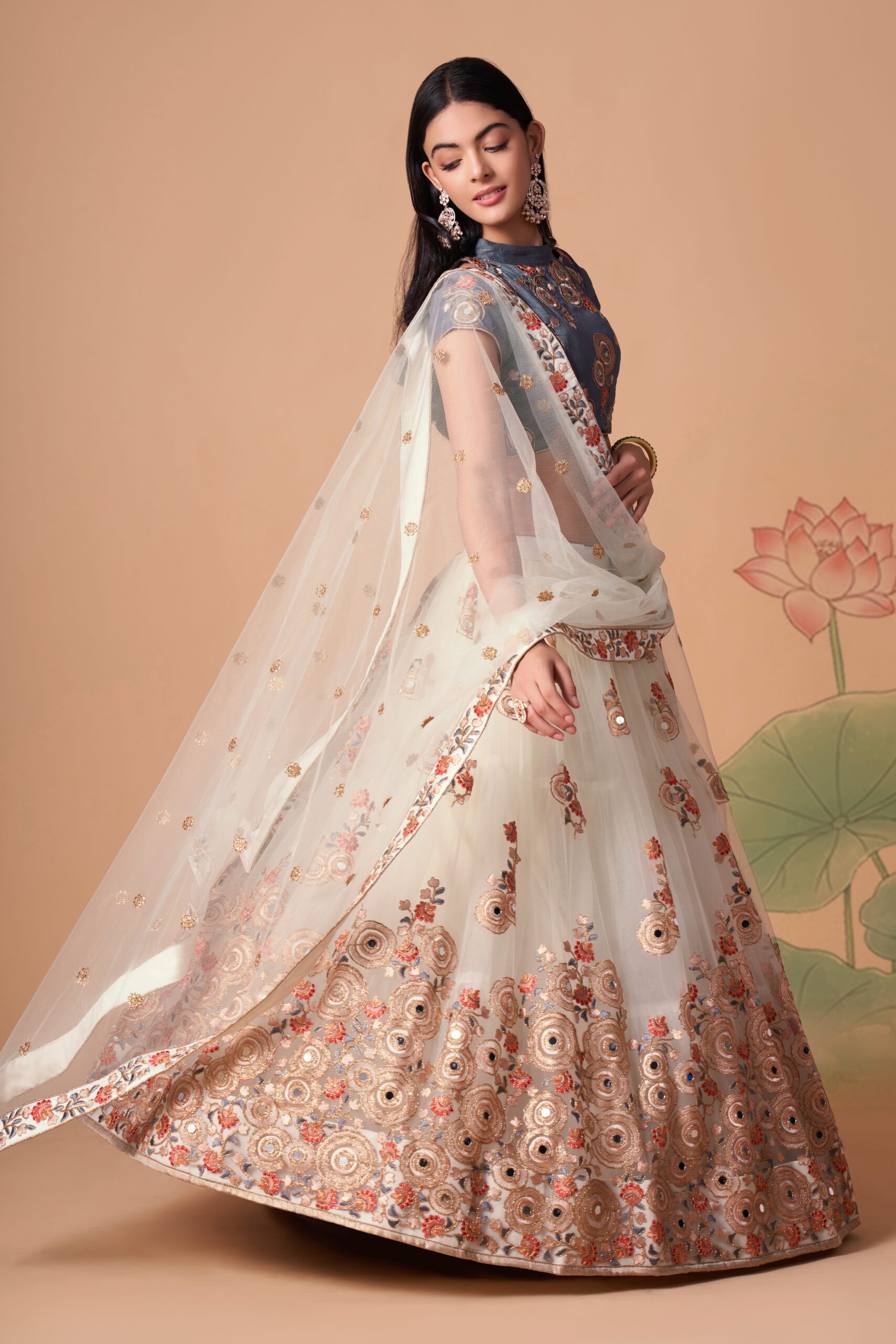Off White Color Soft Net Fabric Sequence Embroidery With Mirror Work Lehenga