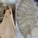 Designer Gold Color Soft Net Fabric With Sequence Work Lehenga Choli