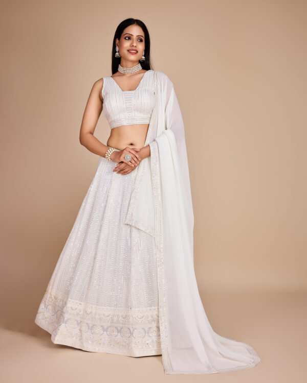 White Color Faux Georgette Fabric Sequence Thread Work Lehenga Choli