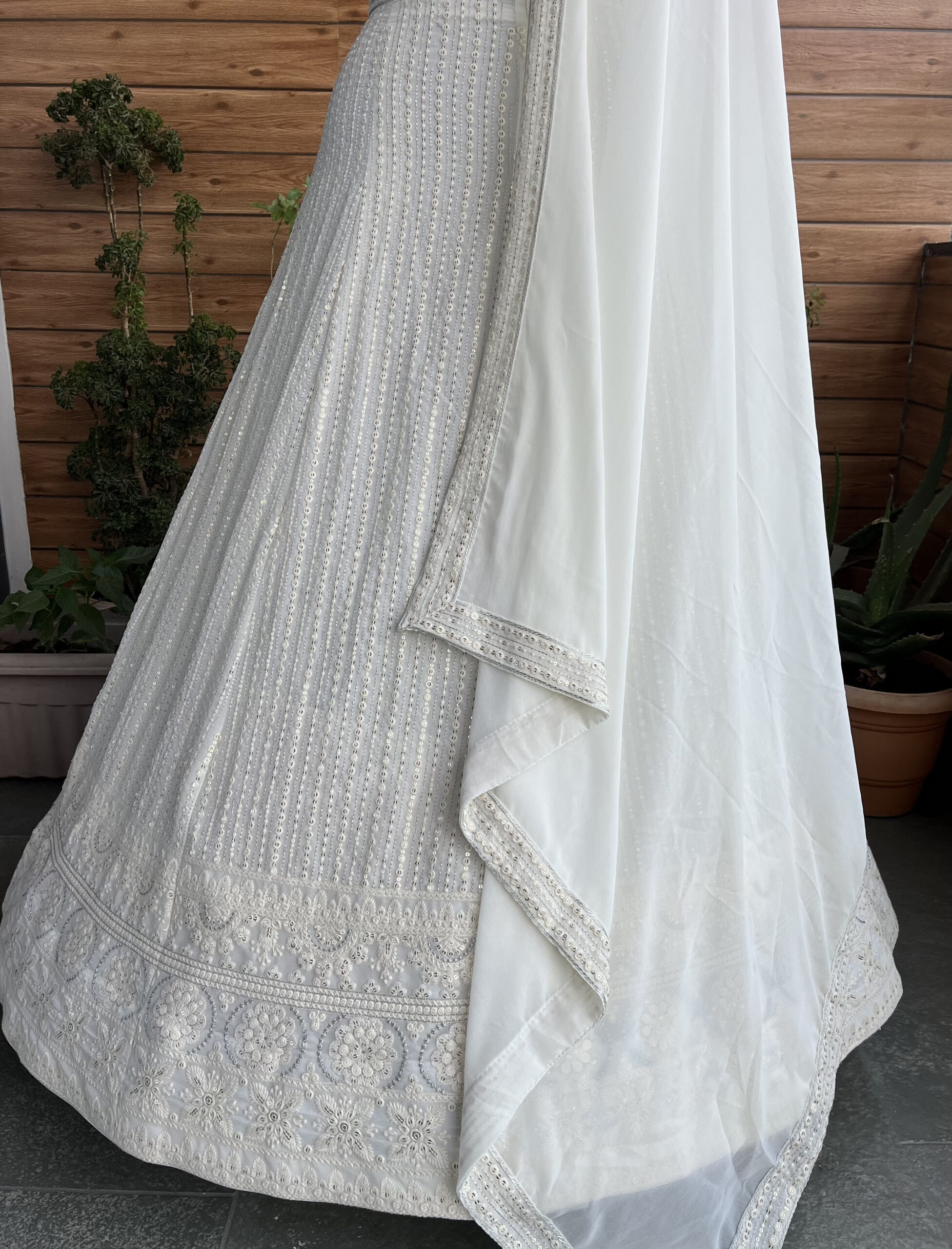 White Color Faux Georgette Fabric Sequence Thread Work Lehenga Choli