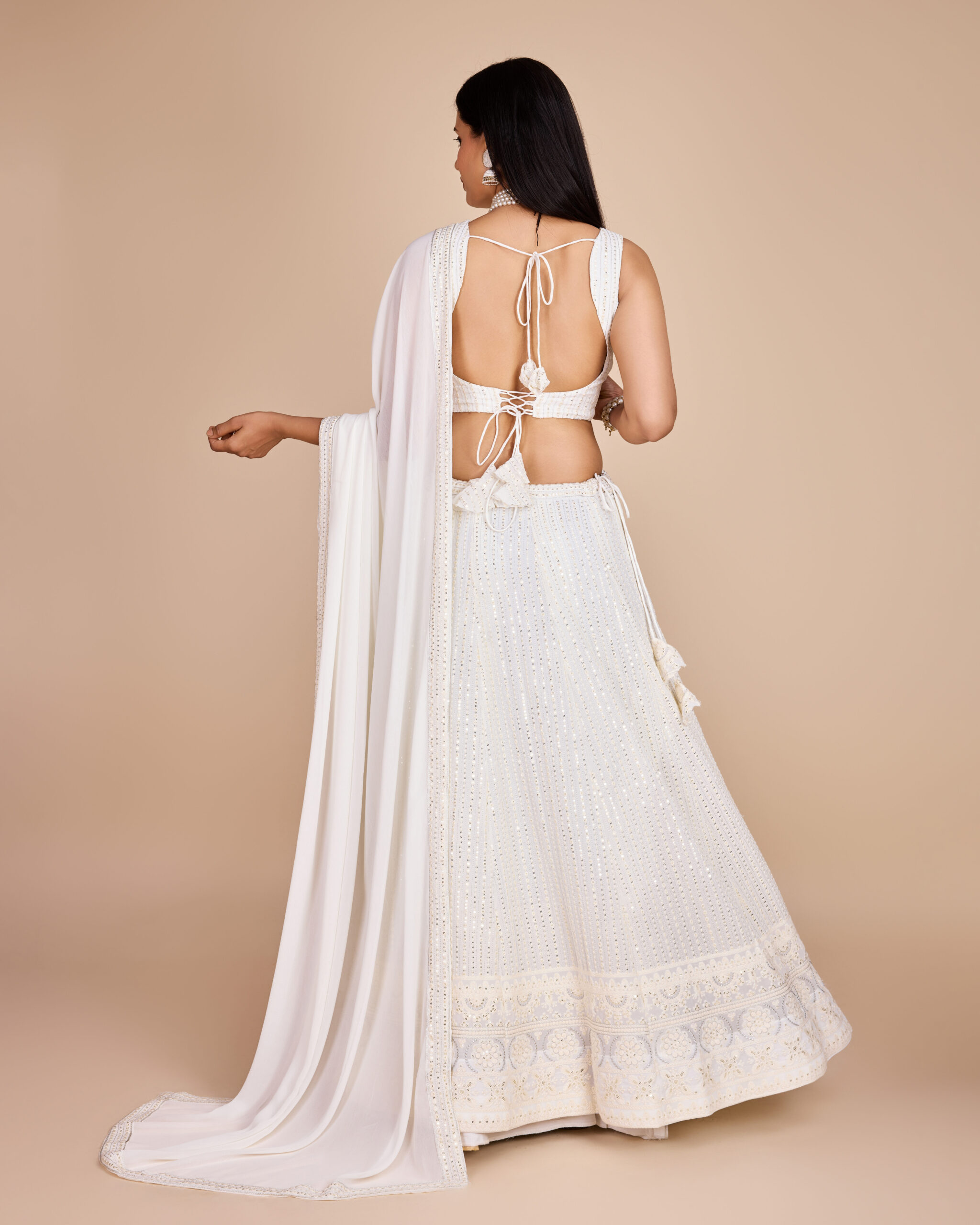 White Color Faux Georgette Fabric Sequence Thread Work Lehenga Choli