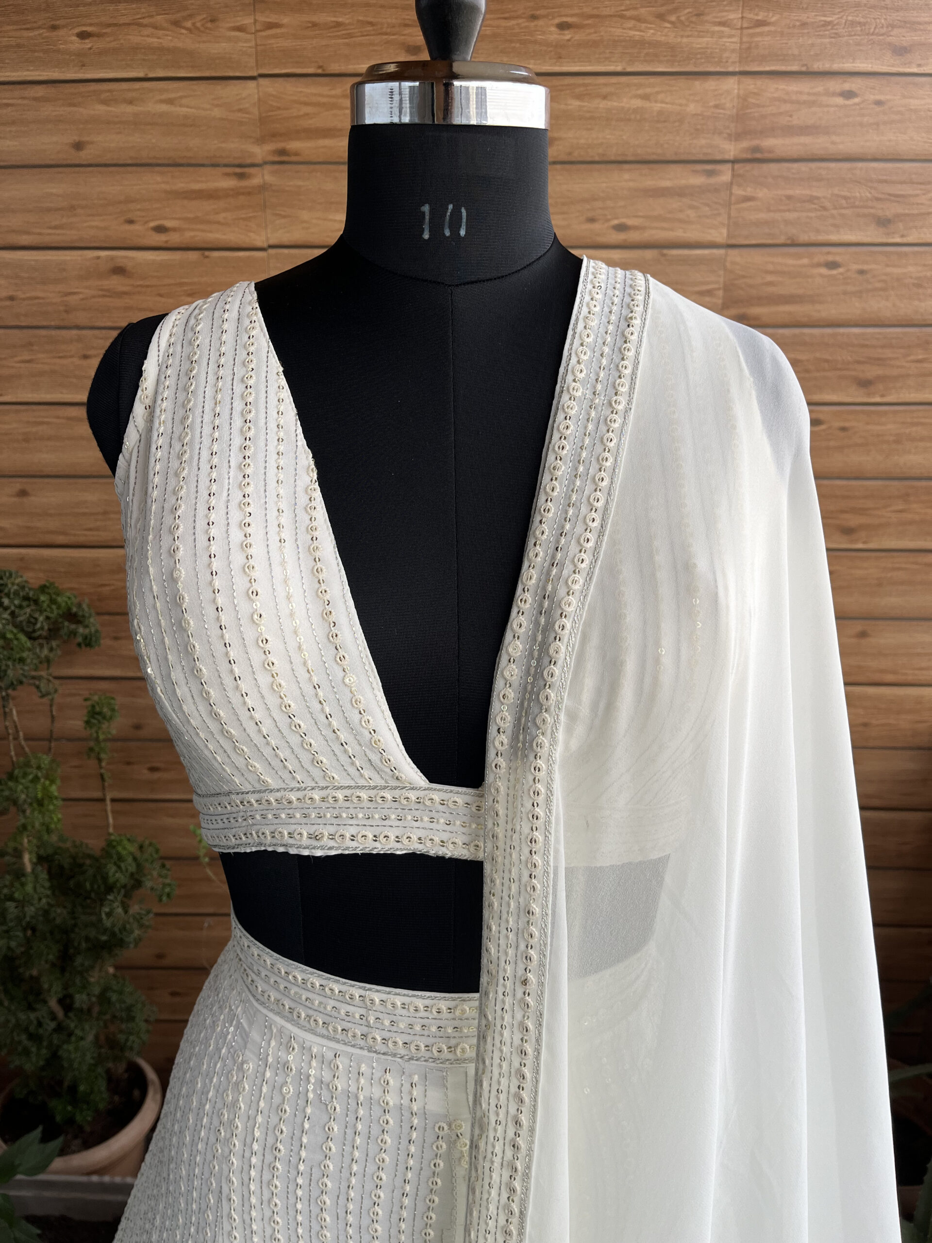 White Color Faux Georgette Fabric Sequence Thread Work Lehenga Choli