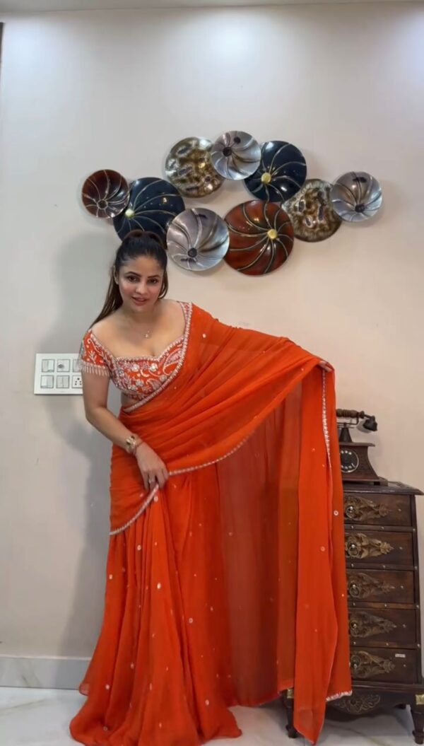Orange Color Faux Georgette Ready To Wear Ruffle Style Lehenga Saree