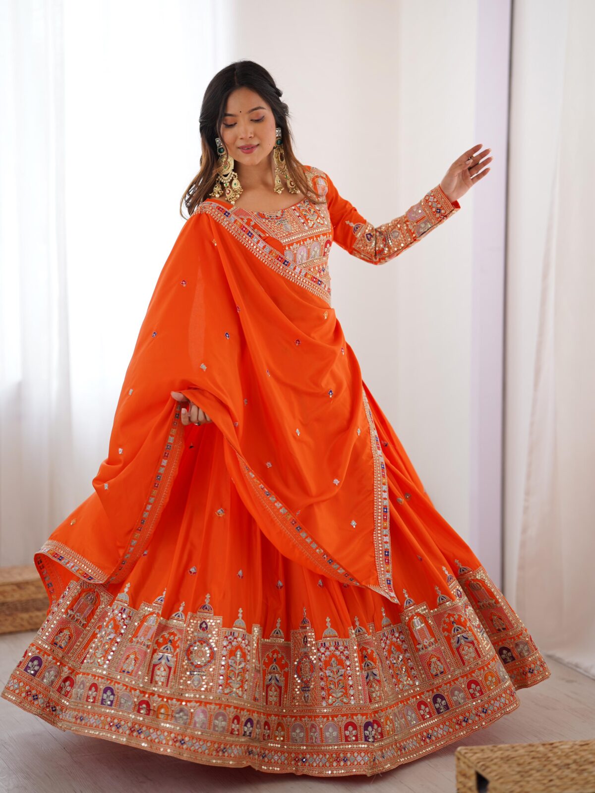 Orange Color Natural Crepe Silk Fabric Thread With Sequence Work Lehenga