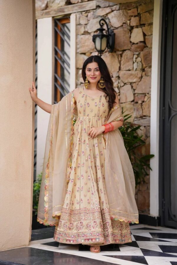 Light Yellow Color Faux Georgette Fabric Thread With Sequence Work Suit