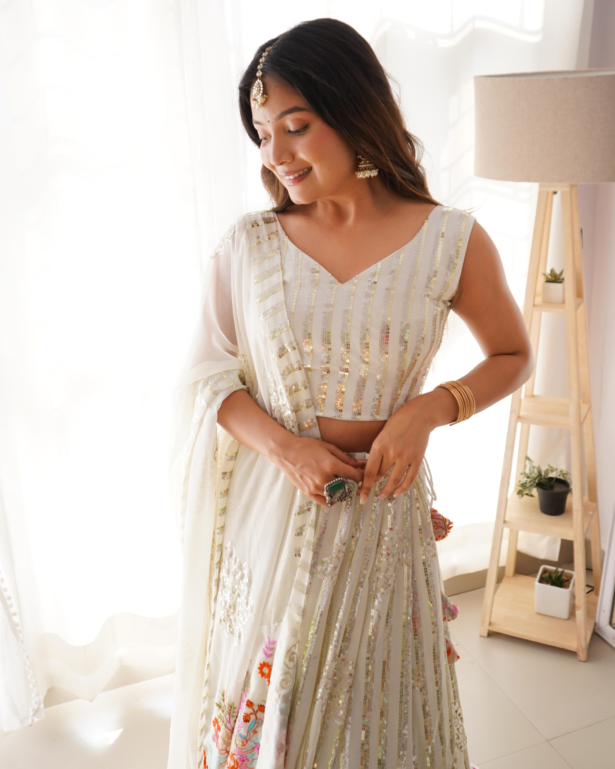 White Color Faux Georgette Fabric Thread With Sequence Work Lehenga