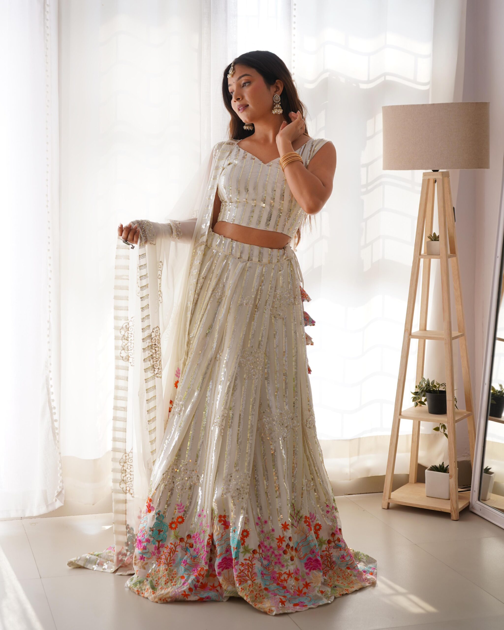 White Color Faux Georgette Fabric Thread With Sequence Work Lehenga