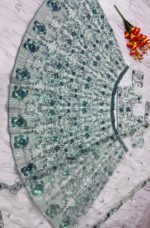 White Color Faux Georgette Fabric Sequence Work Lehenga