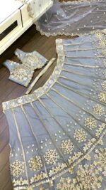 Sky Blue Color Net Fabric Foil Paper With Jari Work Lehenga