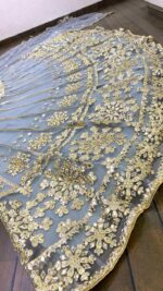 Sky Blue Color Net Fabric Foil Paper With Jari Work Lehenga