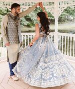 Sky Blue Color Net Fabric Foil Paper With Jari Work Lehenga