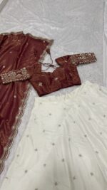 White Color Pure Crepe Silk Fabric Sequence With Jari Work Lehenga