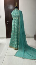 Teal Green Color Pure Banarasi Jacquard Dola Silk Fabric Border Work Gown