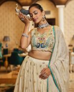 Cream Color Chinon Silk Fabric Sequence Work Lehenga