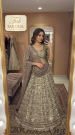 Gold Color Faux Georgette Fabric Sequence With Jari Work Lehenga