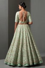 Pista Color Mulberry Silk Fabric Sequence With Net Ruffle Work Lehenga