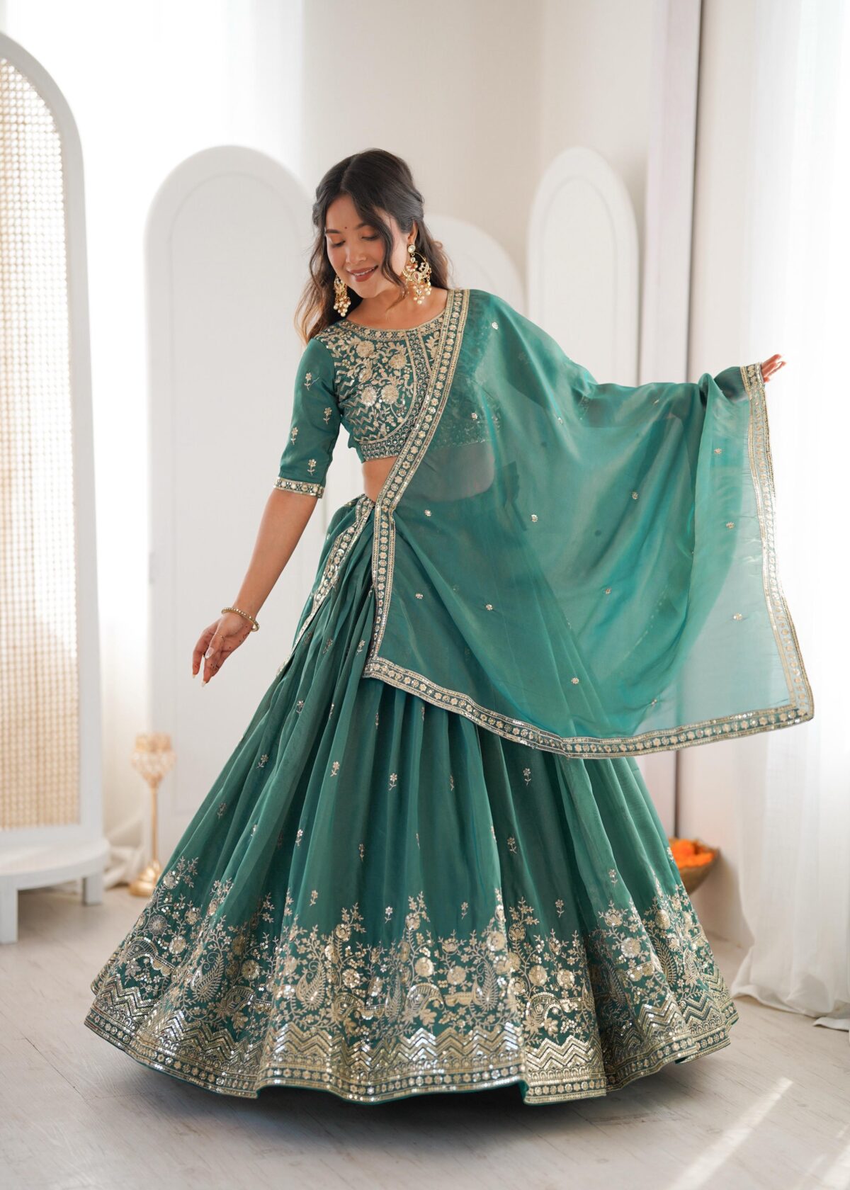 Teal Color Shimmer Silk Fabric Sequence Work Lehenga