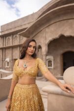 Gold Color Soft Net Fabric Coding With Sequence Work Lehenga