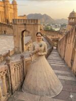 Cream Color Rangoli Silk Fabric Sequence With Embroidery Cut Work Lehenga