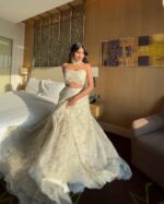 Off White Color Tabby Silk Fabric Rainbow Sequence Work Lehenga