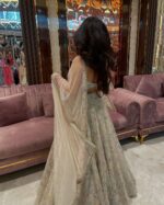 Off White Color Tabby Silk Fabric Rainbow Sequence Work Lehenga