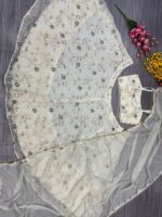 Off White Color Tabby Silk Fabric Rainbow Sequence Work Lehenga