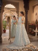 Sky Blue Color Rangoli Silk Fabric Foil Mirror Work Lehenga