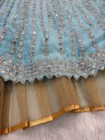 Sky Blue Color Rangoli Silk Fabric Foil Mirror Work Lehenga