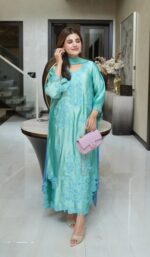 Bottle Green Color Heavy Rayon Fabric Thread Work Suit