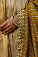 Gold Color Viscose Banarasi Silk Fabric Embroidery Work Gown