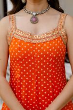 Rakhi Special Orange Color Bandhani Vichitra Silk Fabric Real Mirror Work Palazzo Gown
