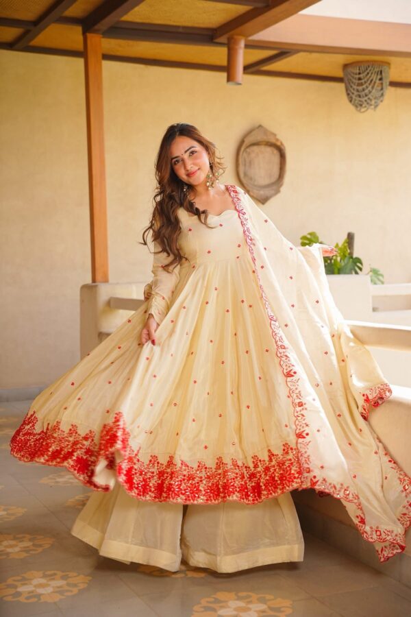 Off White Color Heavy Silk Fabric Sequence With Embroidery Work Gown