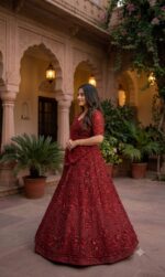Red Color Net Fabric Sequence With Pearl Bead Work Lehenga